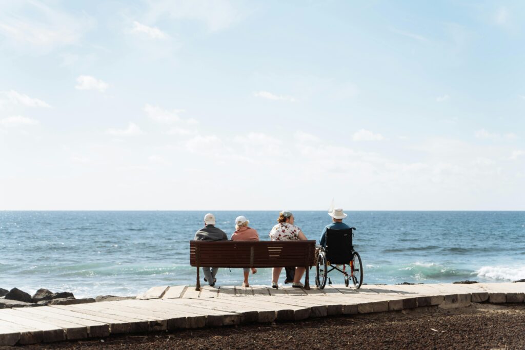 pexels-photo-30327812-30327812 Elderly individuals enjoying a peaceful day by the ocean in the Canary Islands.